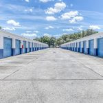 Row of Drive-Up storage units with blue doors