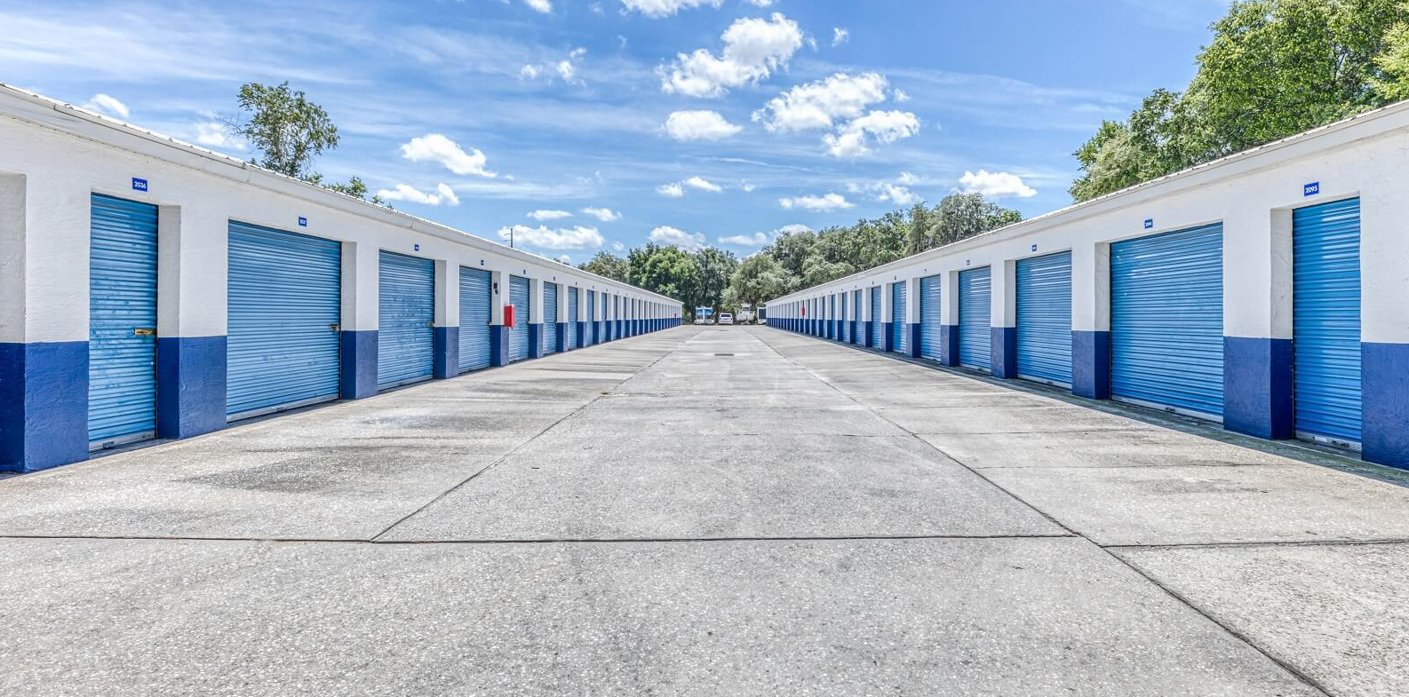 Row of Drive-Up storage units with blue doors