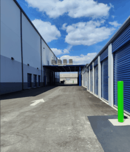 Row of drive-up storage units with a view of the covered loading bay