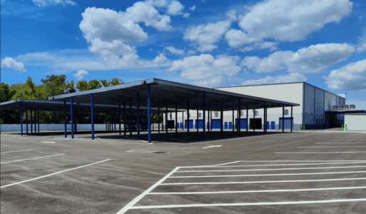 wide angle of the various outdoor vehicle storage spots and the large parasol for covered parking spots