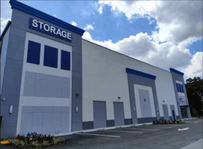 Side of the building with a large sign that says "Storage" with Mission Storage's branding